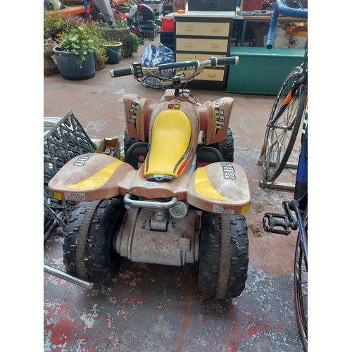 674 - A red Rampage Super 600 ride on electric quad