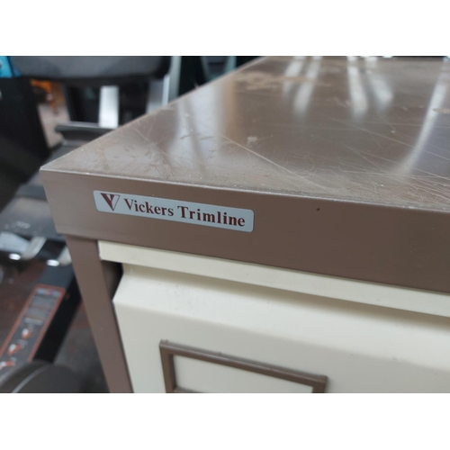 687 - A Vickers Trimline brown and cream metal two drawer office filing cabinet