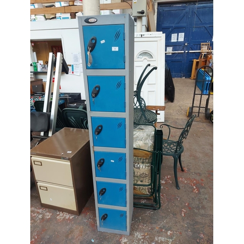 688 - A blue and grey Action storage system gym style six door locker with keys