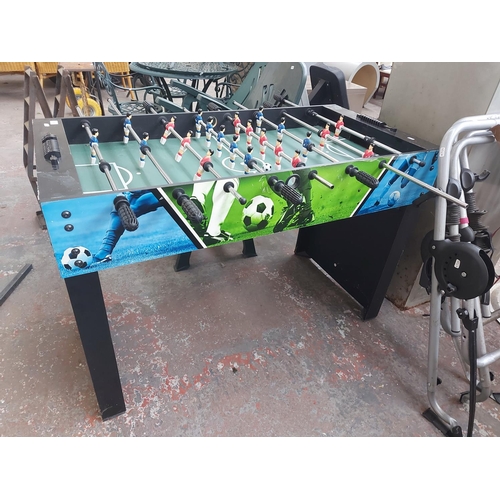 695 - A 4' x 2' table football game with ball