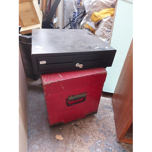 713 - Two items to include a black metal cash register drawer with key and a red painted wooden tool chest