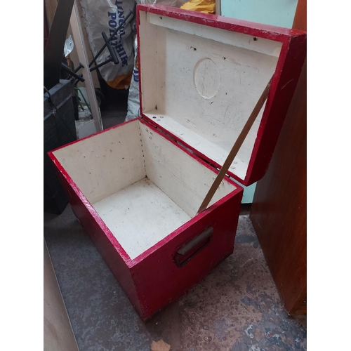 713 - Two items to include a black metal cash register drawer with key and a red painted wooden tool chest