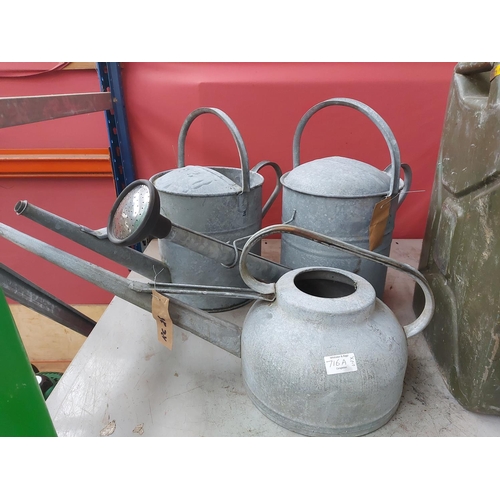 716a - Three vintage galvanised watering cans