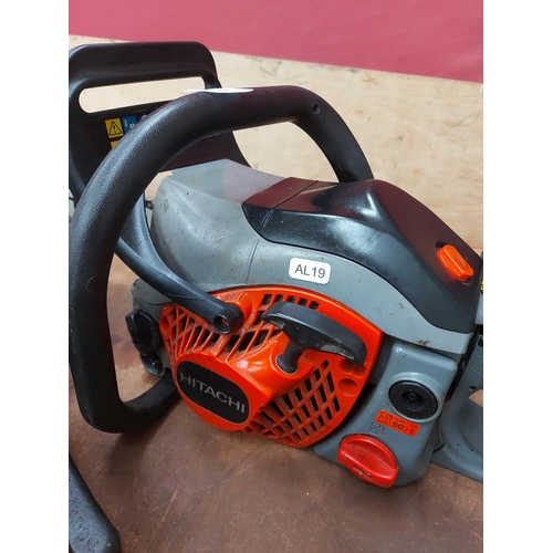 723 - An orange, black and grey Hitachi CS33EB petrol chainsaw with 13