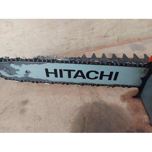 723 - An orange, black and grey Hitachi CS33EB petrol chainsaw with 13