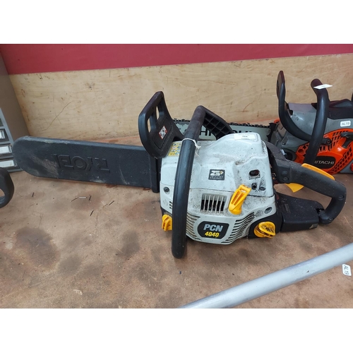 724 - A black and grey Ryobi PCM4040 petrol chainsaw with 16