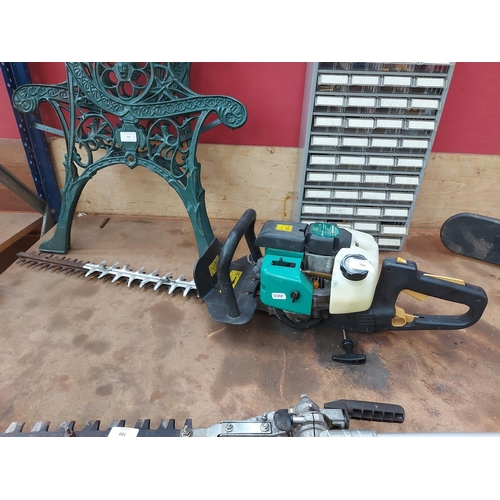 726 - A black and green Gardenline GPHS26CC petrol hedge trimmer with 21