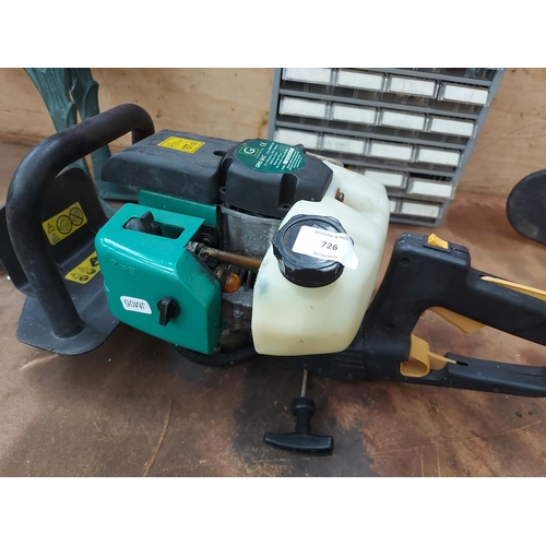 726 - A black and green Gardenline GPHS26CC petrol hedge trimmer with 21