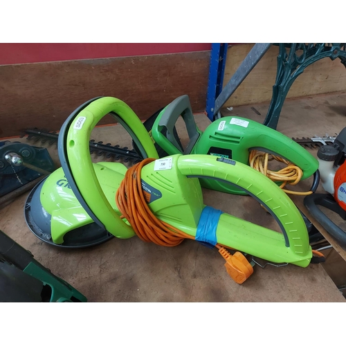 730 - Two items to include a green Xceed electric hedge trimmer with 20