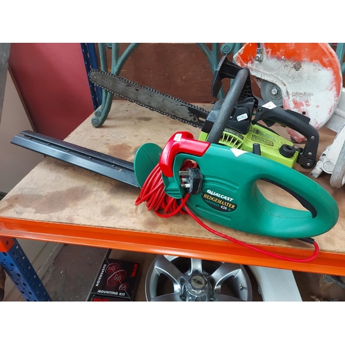 736 - Two items to include a black and green Poulan 2300CVA petrol chainsaw with 16