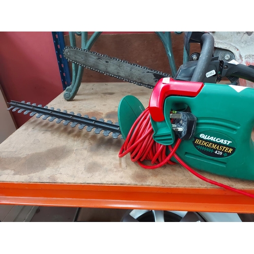 736 - Two items to include a black and green Poulan 2300CVA petrol chainsaw with 16