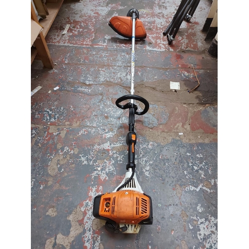 737 - A multicoloured Stihl FS91R petrol strimmer