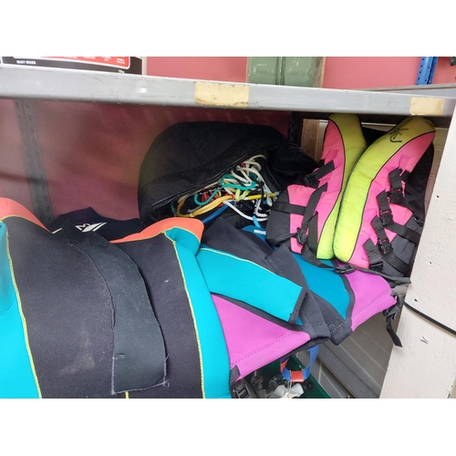 746 - A mixed lot of water ski equipment to include Americas Cup life jacket, Eagle ski shorts, wetsuit, P... 