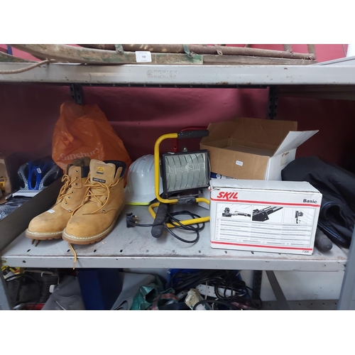 749 - A mixed lot to include boxed Skil flatbed sander, halogen work light, size 10 Groundwork safety boot... 