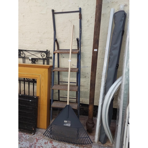 777 - Two items to include a vintage wood and metal five tread step ladders and a new Kent & Stowe garden ... 