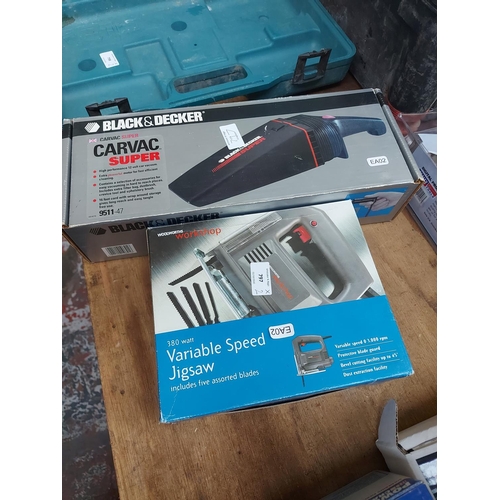 797 - Two boxed items to include a Black and Decker 9511 car vacuum cleaner and a Woolworths workshop 380 ... 