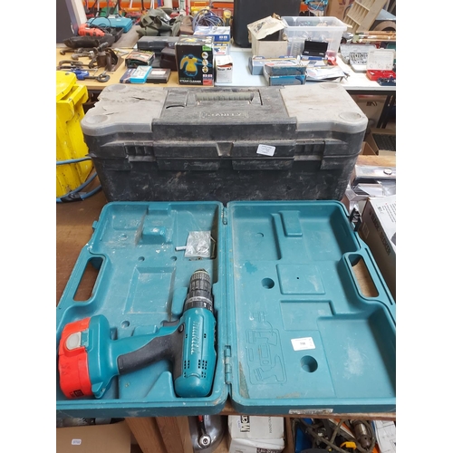 798 - Two items to include a cased Makita 8390D 18v cordless drill with battery but no charge and a black ... 