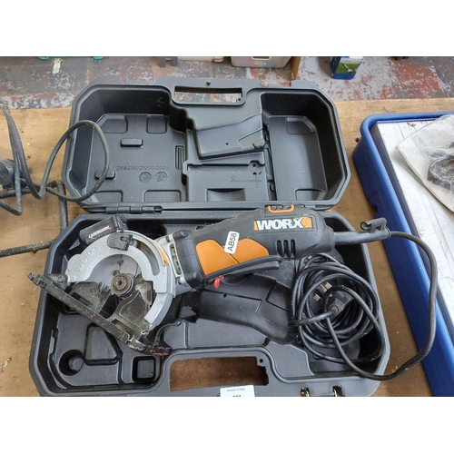 801 - A cased black and orange Worx WX426 handheld circular saw