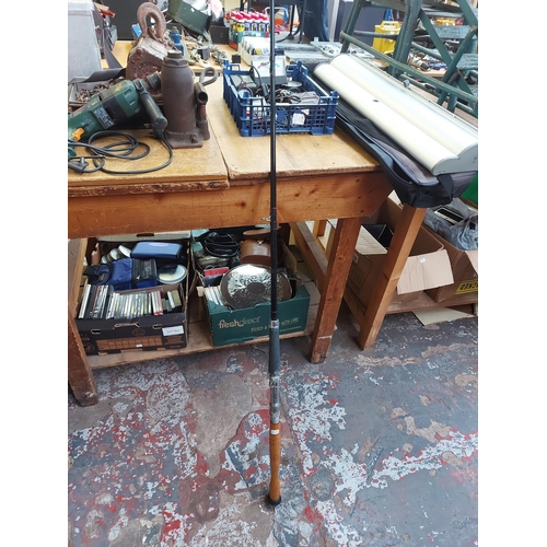 809 - A mixed lot of fishing equipment to include one piece sea fishing rod, Garcia Mitchell 624 reel, alu... 