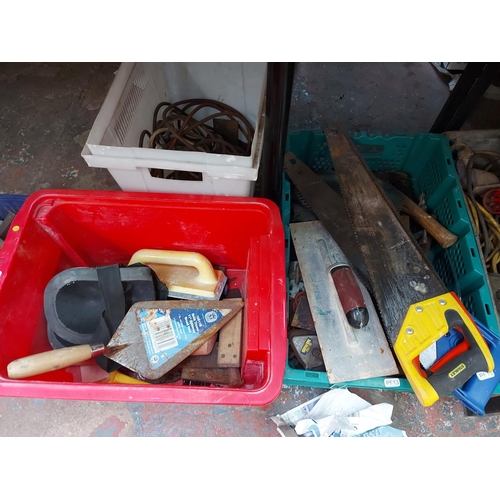 856 - Six mixed boxes containing handsaws, plastering float, hammer, bricking trowel etc.