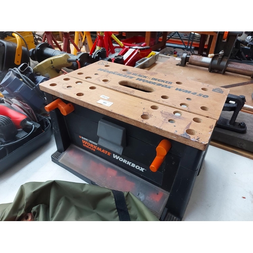 885 - Two items to include a red Yorke 3 & 1/4 inch bench vice and a Black and Decker WM450 workmate workb... 