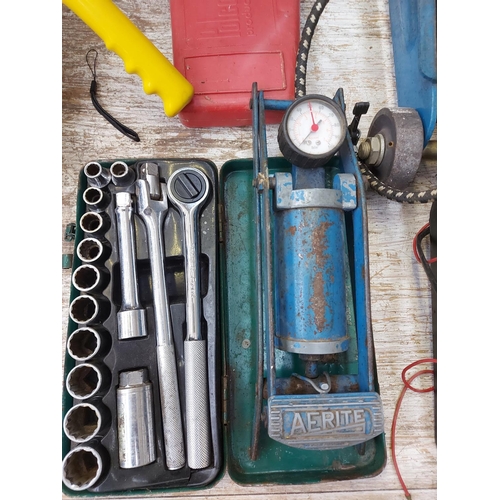 888 - A mixed lot of eight items to include a blue Master Mechanic 2 ton trolley jack, a Bradex battery ch... 