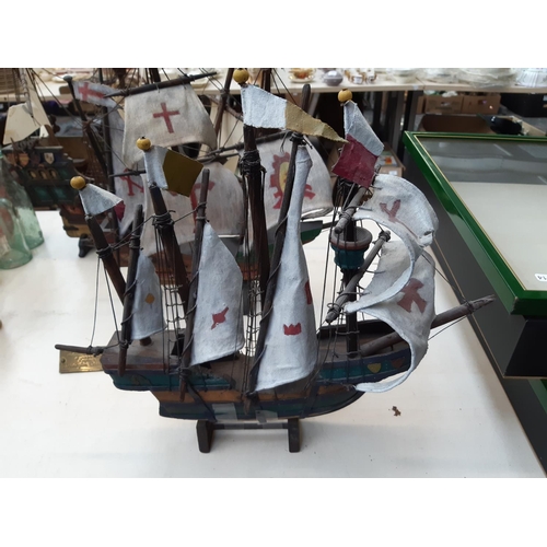 166 - Three wooden ship models