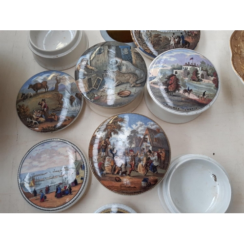 196 - A collection of fourteen 19th century Prattware pot lids to include Dr. Johnson, Persuasion, The Ent... 