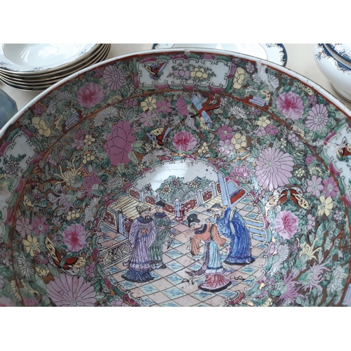 197 - Two items to include a large Chinese porcelain famille verte bowl and a Chinese porcelain plate with... 