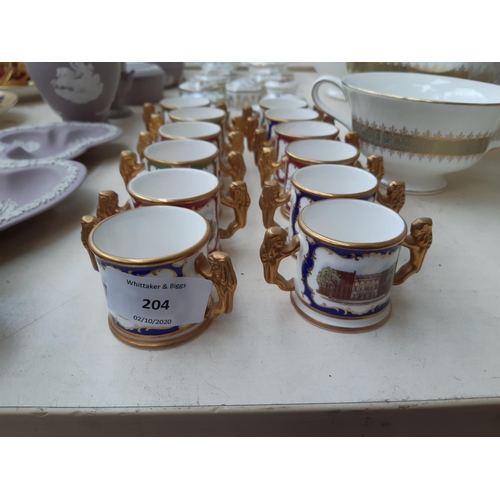 204 - A collection of miniature ceramics to include a set of twelve Paragon loving cups Commemorating Roya... 