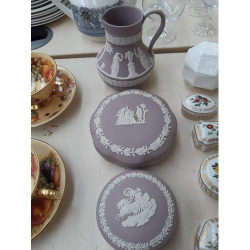 205 - A collection of eight pieces of Wedgwood Lilac Jasperware to include egg shaped trinket pot, two tri... 