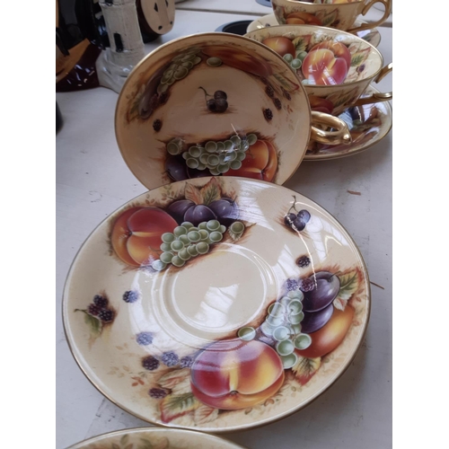 206 - Four Aynsley Orchard Gold tea cups and saucers (see condition report)