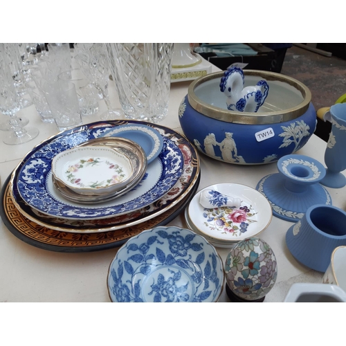 214 - A collection of assorted ceramics to include seven pieces of Wedgwood blue jasperware, Mason's Manda... 