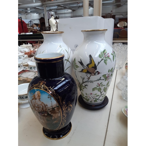 217 - Five Franklin Mint porcelain vases to include two 'The Woodland Bird' vases, Primavera vase, The Gar... 