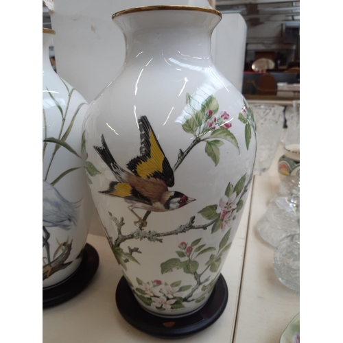 217 - Five Franklin Mint porcelain vases to include two 'The Woodland Bird' vases, Primavera vase, The Gar... 