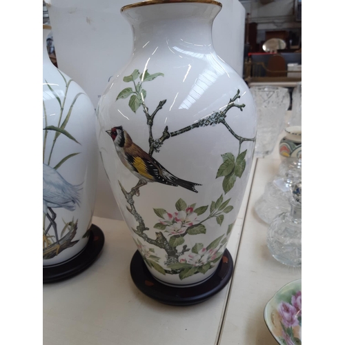 217 - Five Franklin Mint porcelain vases to include two 'The Woodland Bird' vases, Primavera vase, The Gar... 