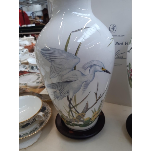 217 - Five Franklin Mint porcelain vases to include two 'The Woodland Bird' vases, Primavera vase, The Gar... 