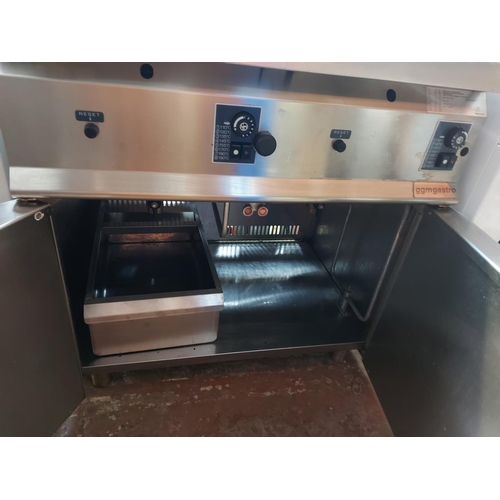 1008 - A Ggmgastro industrial stainless steel twin deep fat fryer with under storage measuring approx. 80cm