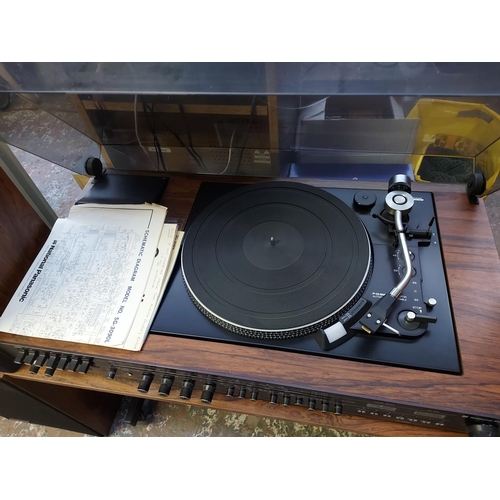 1038 - Eight items to include a vintage National Panasonic SG3090L hi-fi system on stand comprising tuner a... 