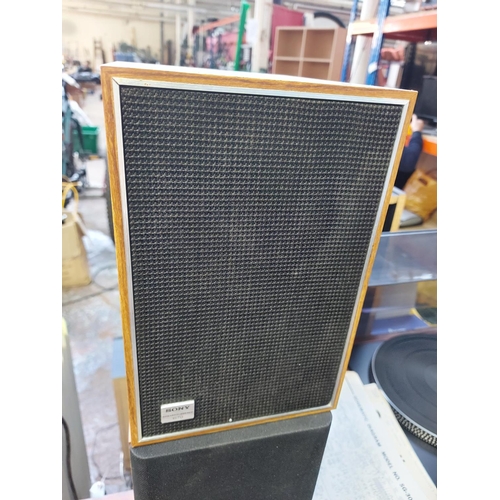 1038 - Eight items to include a vintage National Panasonic SG3090L hi-fi system on stand comprising tuner a... 