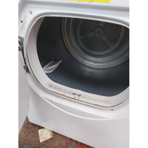 1045 - A Hoover VTV590NC 9kg tumble dryer