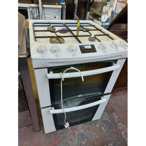 1050 - A Zanussi Electrolux 60cm gas cooker