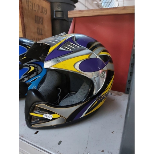 762 - Three various multicoloured motorcycle helmets to include Laser, Bieffe and Caberg