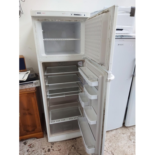 951 - A Bosch Exxcel upright fridge freezer