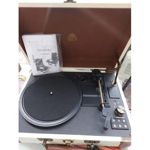 958 - A brown and cream GPO Ambassador Portable Belt Drive Wireless Bluetooth record player with Bluetooth... 