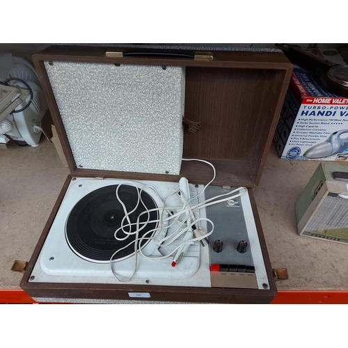 966 - A vintage Claude four speed portable record player with detachable speaker