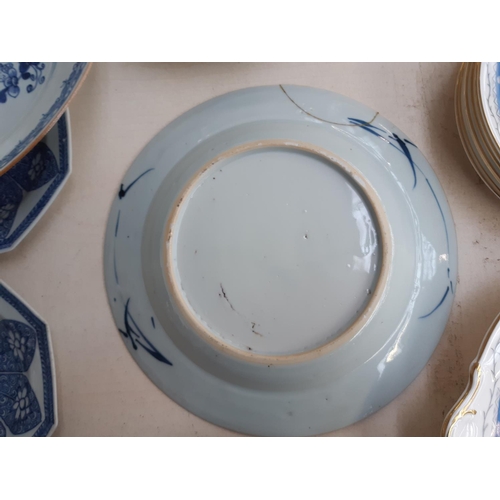 229 - A collection of 19th/20th century oriental ceramics to include a blue and white shallow dish with fl... 