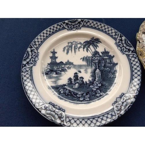 238 - A collection of nine ceramic plates to include James Norris Ltd. blue and white dinner plate titled ... 