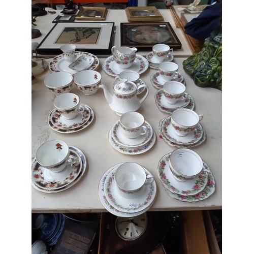 239 - A collection of assorted ceramics to include Paragon Belinda pattern teapot and two trios, twenty pi... 