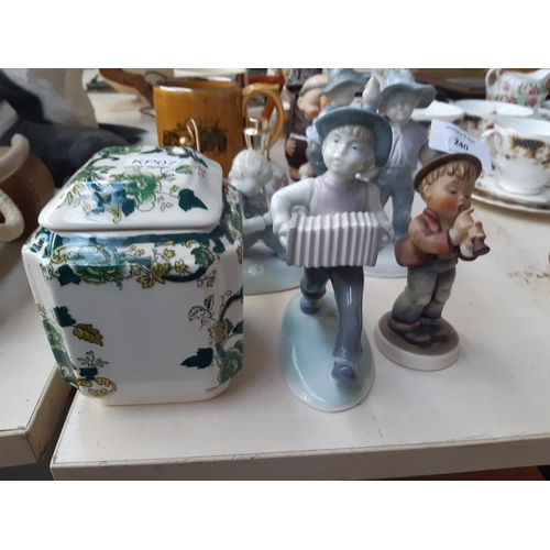 240 - A collection of assorted ceramics to include three West German Goebel figurines, four Lladro style f... 